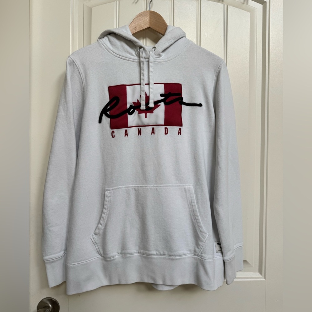 Roots Canada Unisex White Canada Flag Hoodie. Measures Size M/L